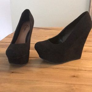 Black suede wedge heels